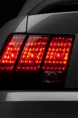 Special Offer Raxiom 99-04 Ford Mustang Excluding 99-01 Cobra Tail Lights- Black Housing (Smoked Lens)