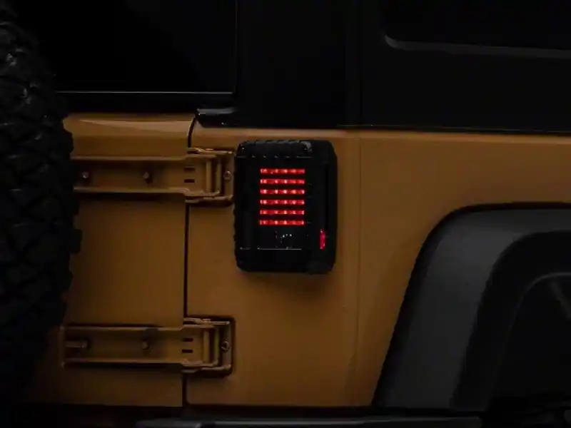 Raxiom 07-18 Jeep Wrangler JK LED Tail Lights- Black Housing (Smoked Lens) Latest