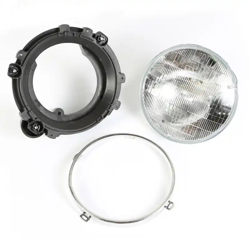 Fan Favorite Omix Headlight Assy With Bulb LH 97-06 Wrangler TJ