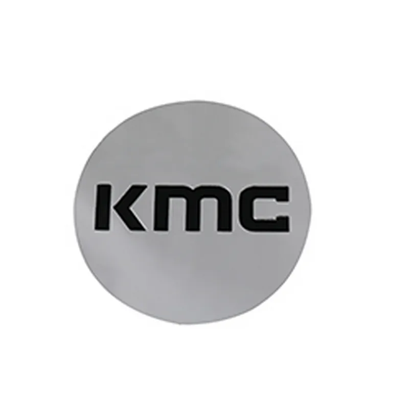 KM704 CAP SNAP IN - CHROME BLACK LOGO Markdown